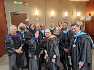 Teachers in regalia at Graduation 2022