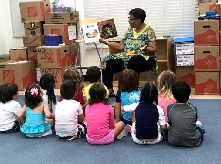 Young children listening to a story