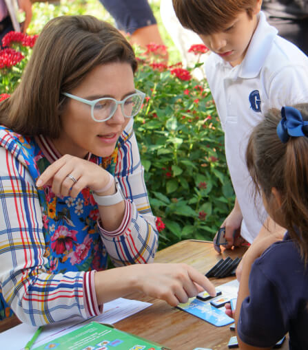 Teacher helping student