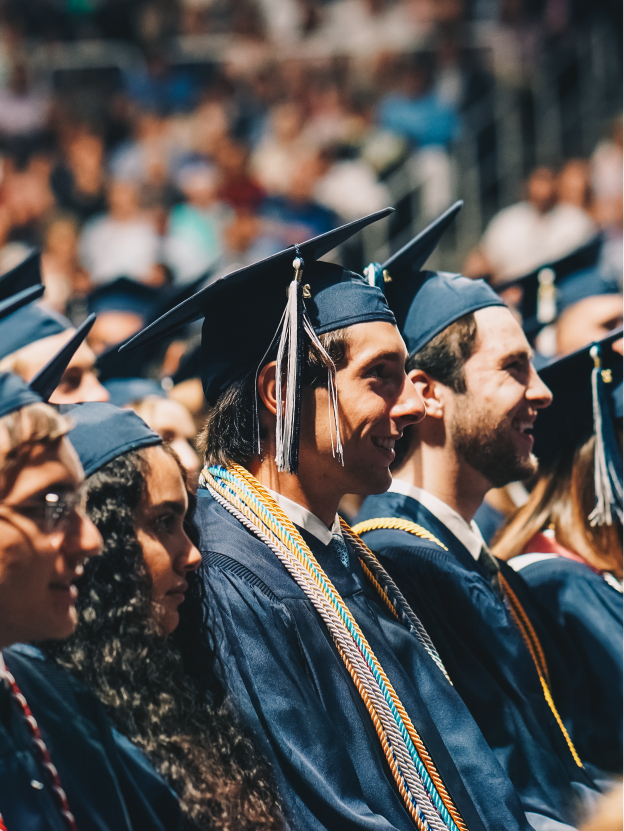 Grads sitting during graduation