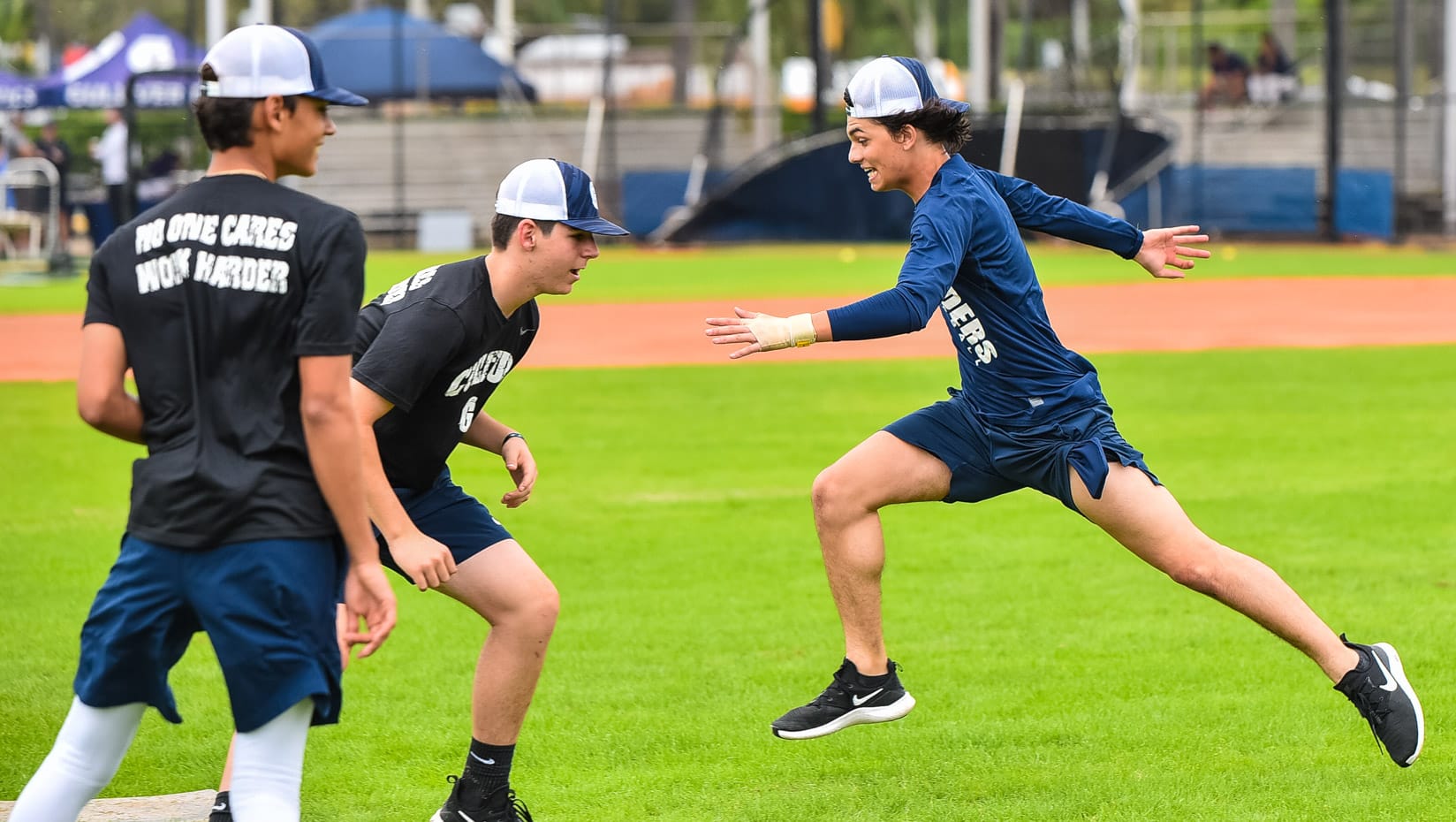 Male students playing soccer