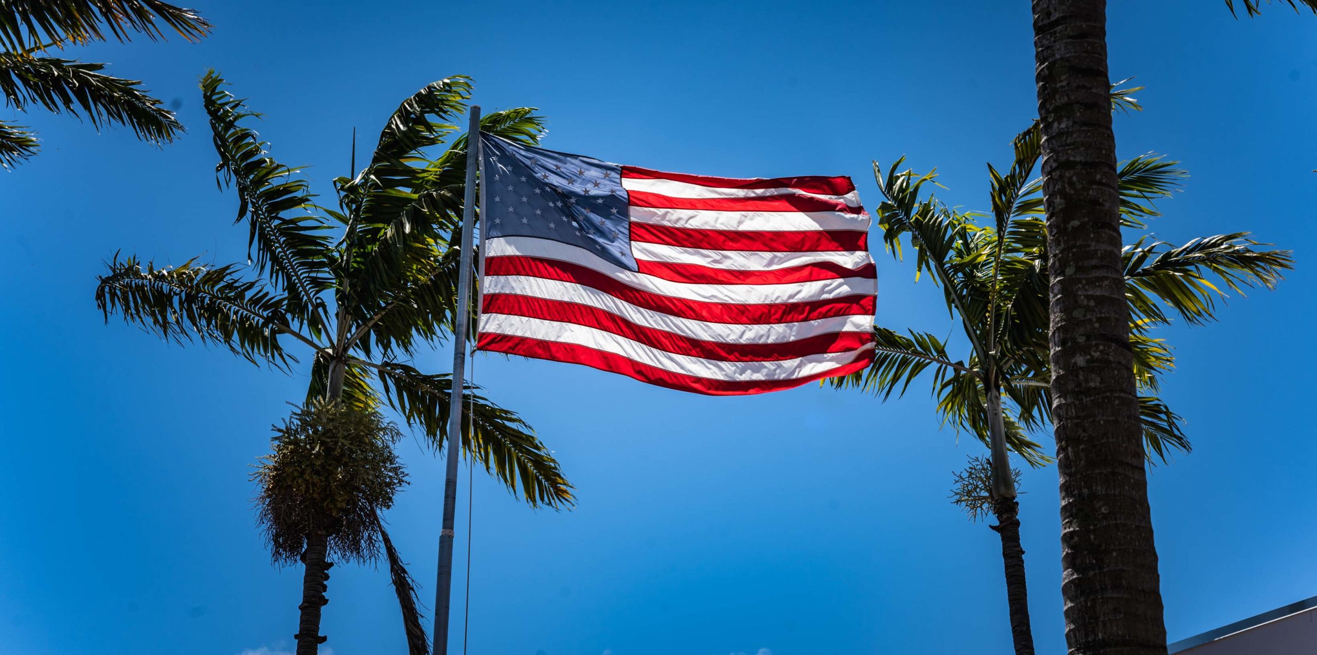 American flag blowing in the air