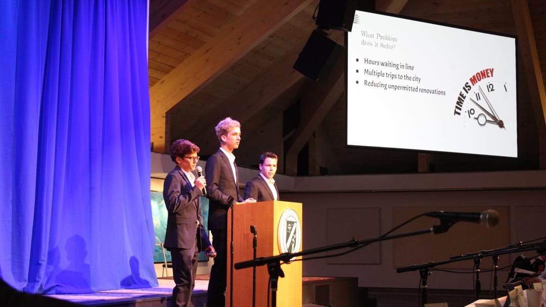 Students presenting at an International Business & Entrepreneurship event