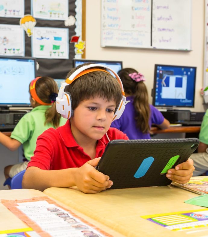 Lower school boy working on his ipad