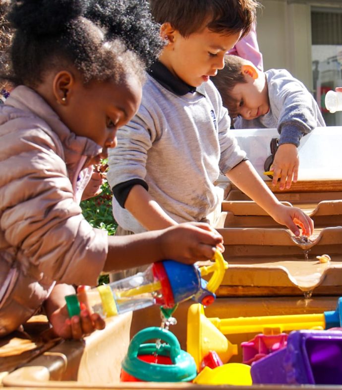 Kindergarten kids playing outside