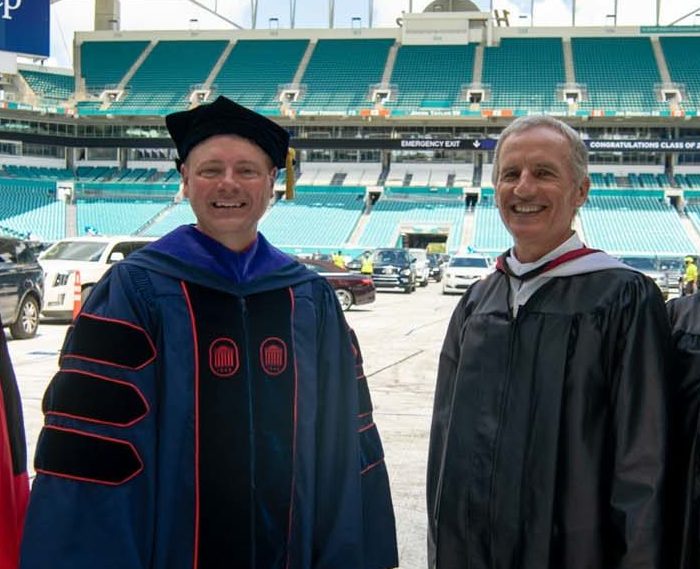 Four members of the Gulliver leadership team standing in the graduation venue