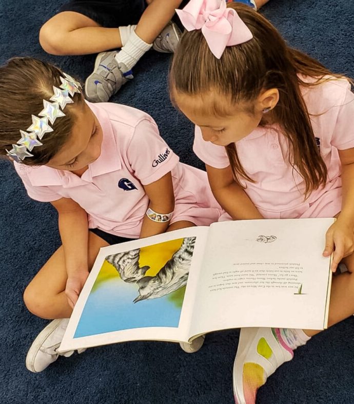 Two lower school girls reading