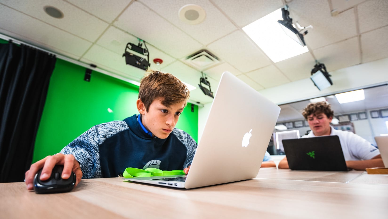 Male student working on a computer