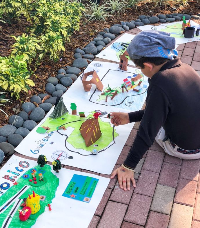 student working on a project about guatemala