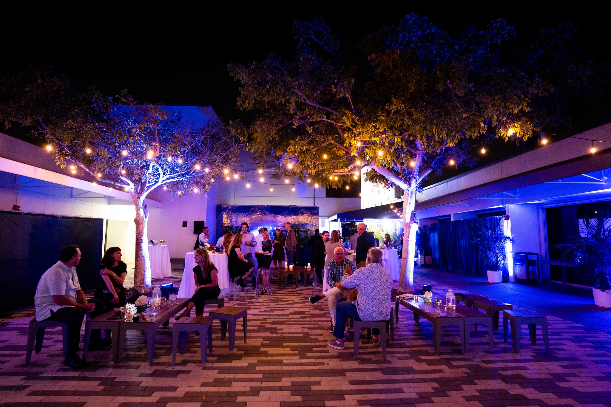 Upper School Courtyard with guests chatting