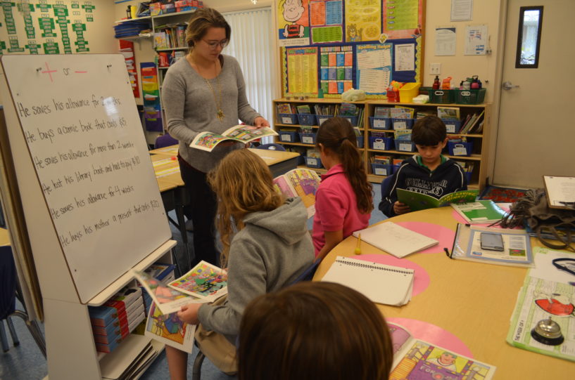 Students reading during summer studies.