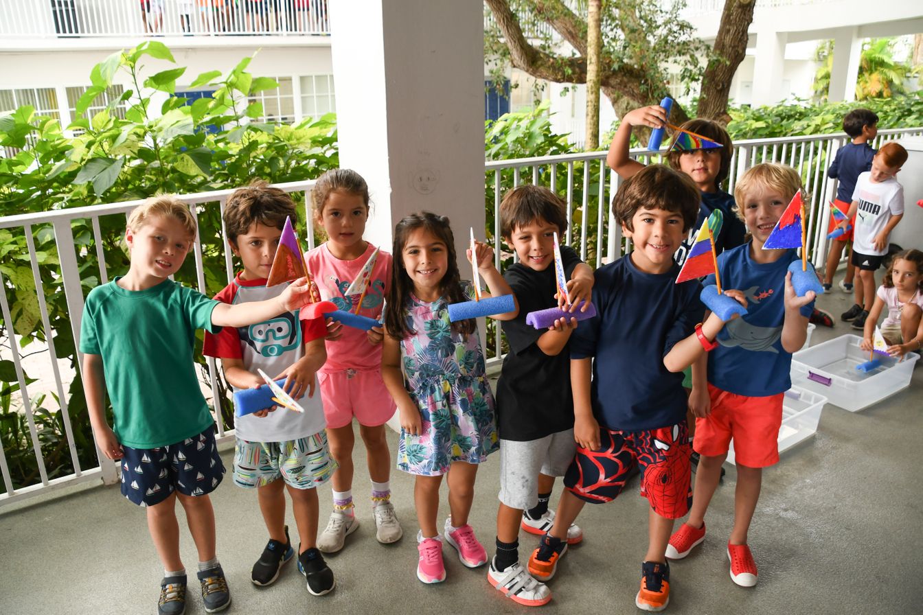kids standing on patio at summer camp program