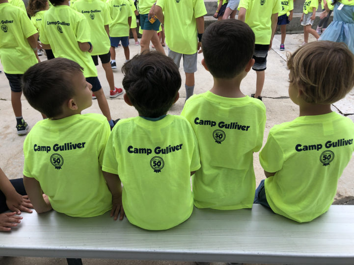 four boys wearing Camp Gulliver shirts