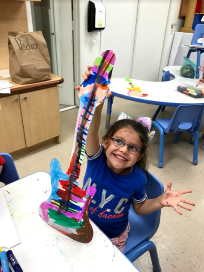 Student enjoys coloring in art class.