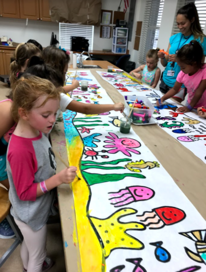Student enjoying art class.