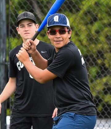 Students practicing baseball