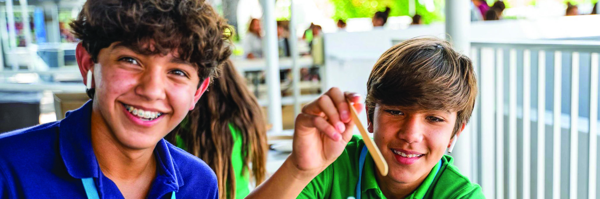 Two male students making a project
