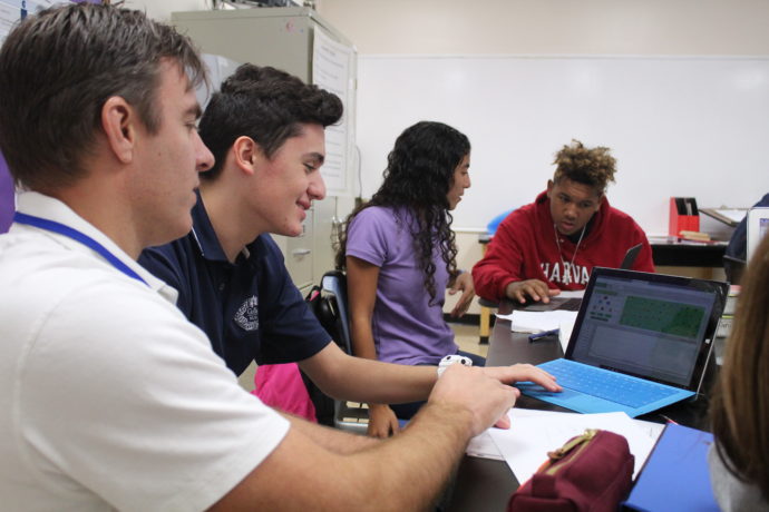 Guidance counselor with students.