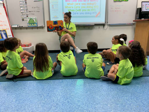 Kids listening to a story at Camp Gulliver.