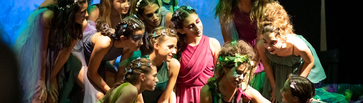 Middle School theatre students performing
